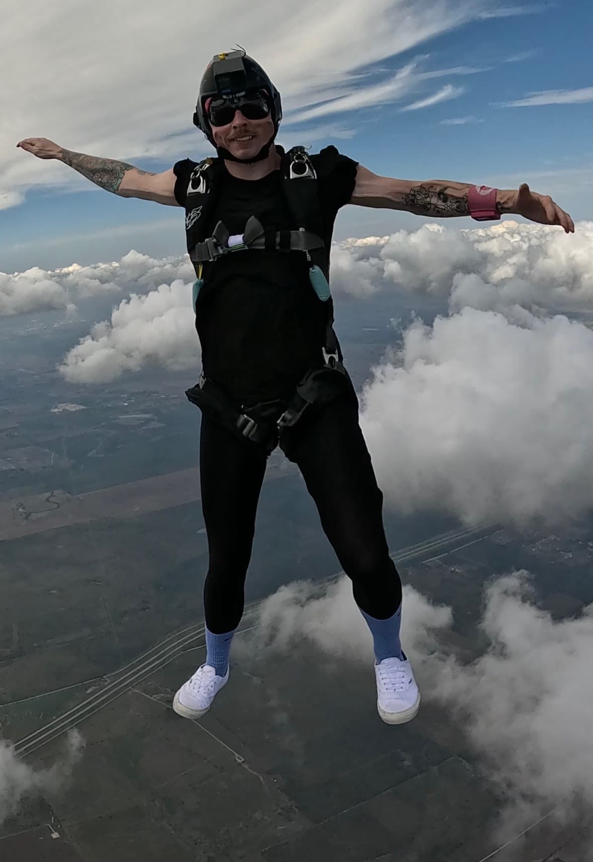 Stephen Grandy in freefall above the clouds